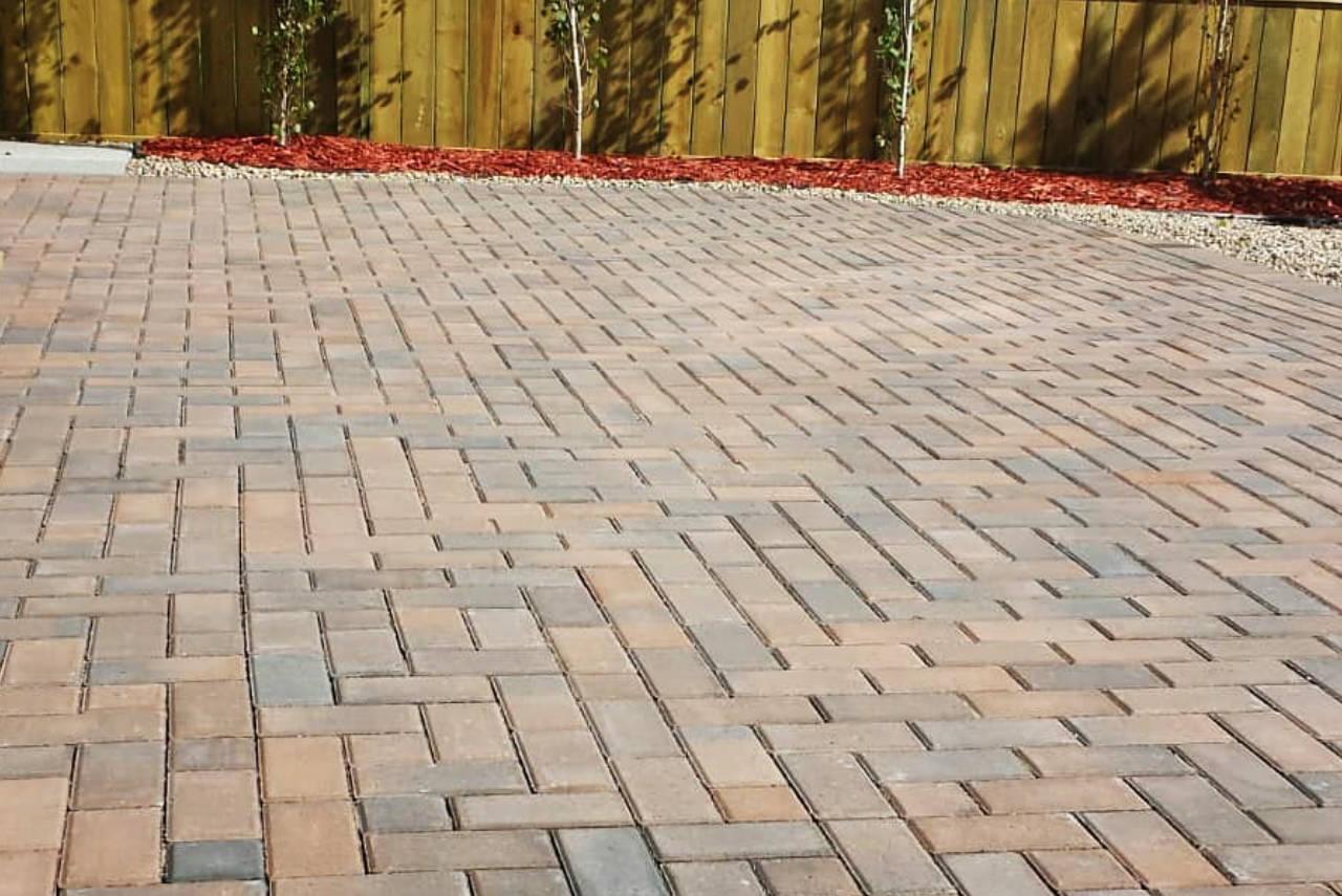Intricately laid natural stone creating a rustic yet elegant patio surface