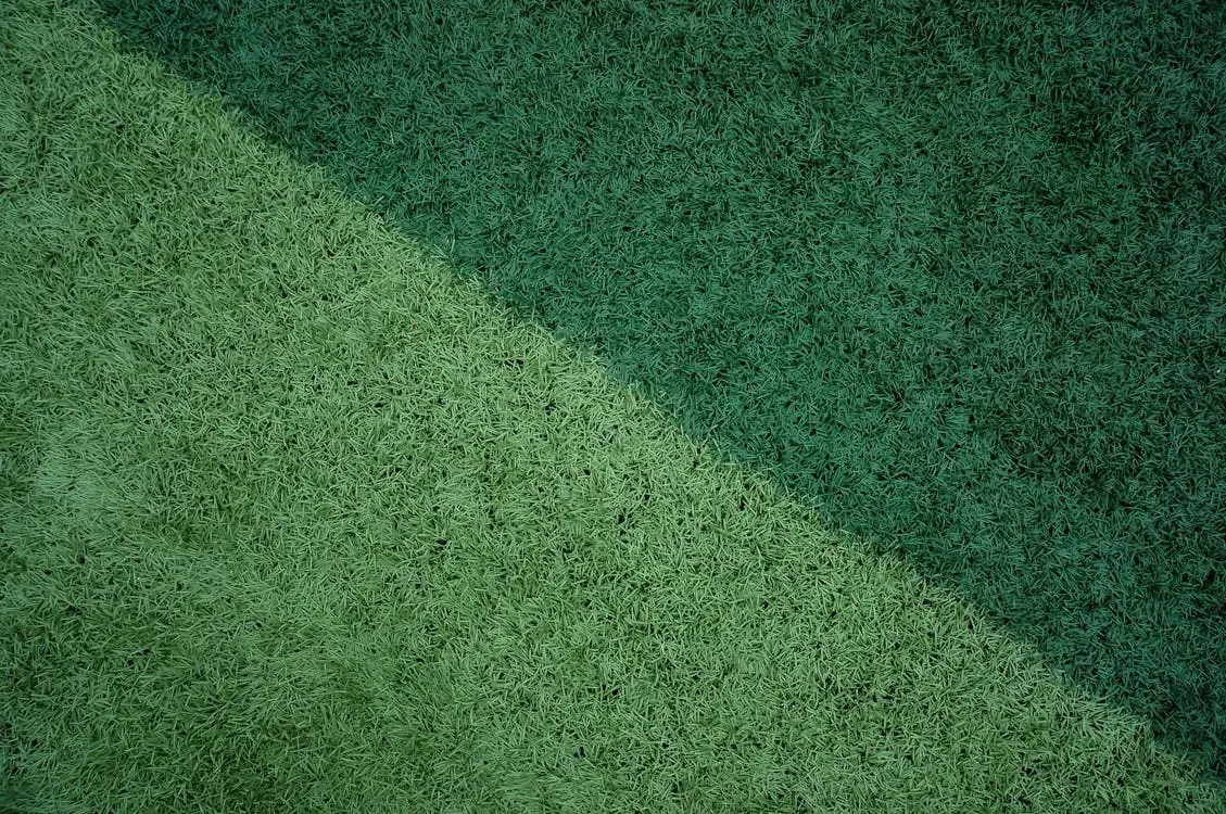 Lush maintenance-free artificial turf in a Calgary residential backyard.